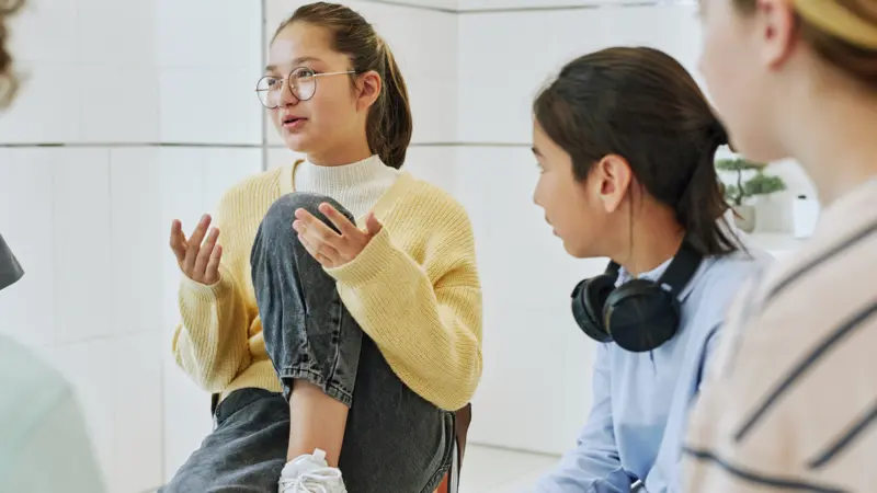 Young adults engaging in support group