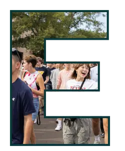Letter E shaped frame with a group of OSU students walking together during convocation